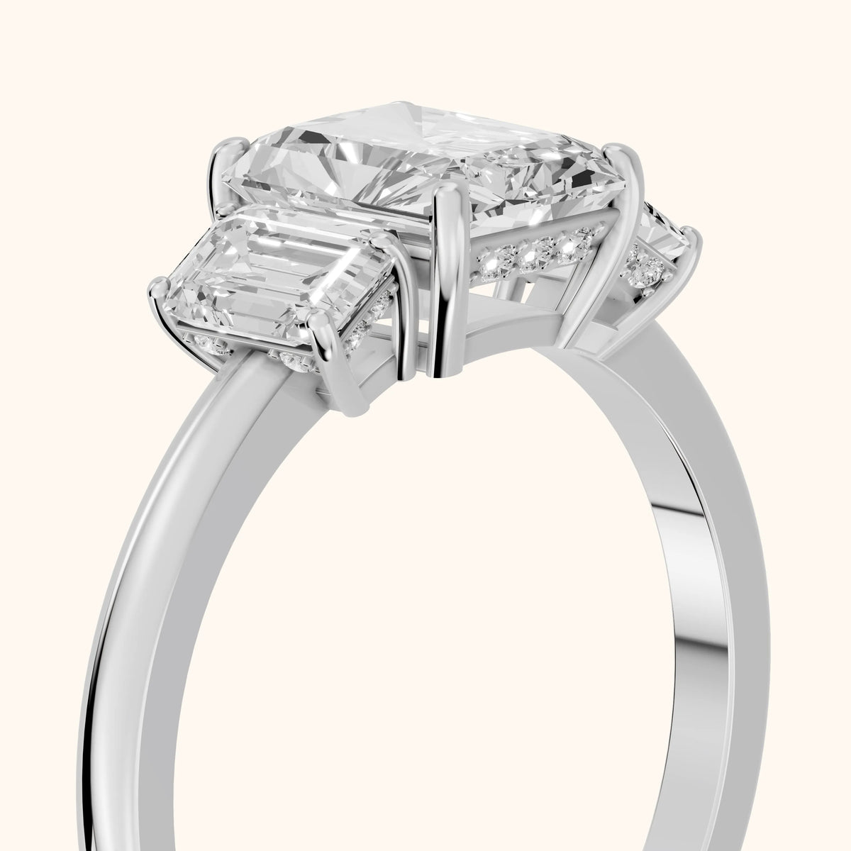 Marian Three-Stone Hidden Halo Radiant Diamond Engagement Ring in Platinum - slant-view.webp