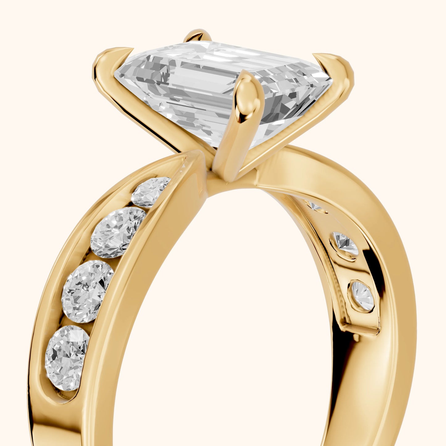 Noor Channel Set Sidestone Emerald Diamond Engagement Ring in Yellow Gold - slant-view.webp