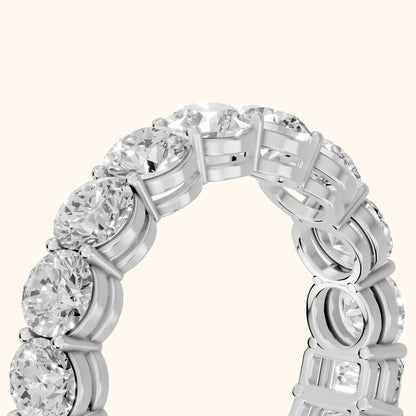 Malia Shared Prong Round & Emerald Diamond Eternity Band in Silver - slant-view