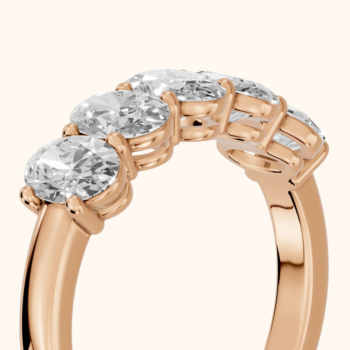 Estela Shared Prong Oval Diamond Wedding Band in Rose Gold - slant-view