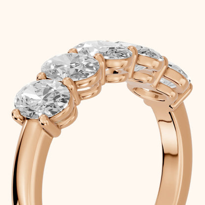 Estela Shared Prong Oval Diamond Wedding Band in Rose Gold - slant-view