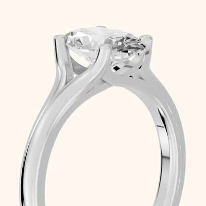 Nell Split Shank Solitaire Oval Diamond Engagement Ring in Platinum - slant-view.webp