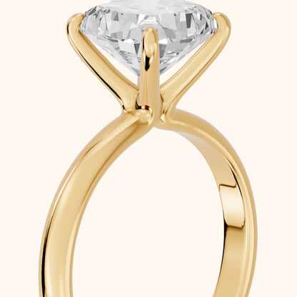 Marietta Tulip Solitaire Cushion Diamond Engagement Ring in Yellow Gold - slant-view.webp
