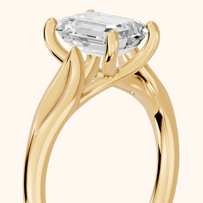 Lauretta Leaf Solitaire Emerald Diamond Engagement Ring in Yellow Gold - slant-view.webp