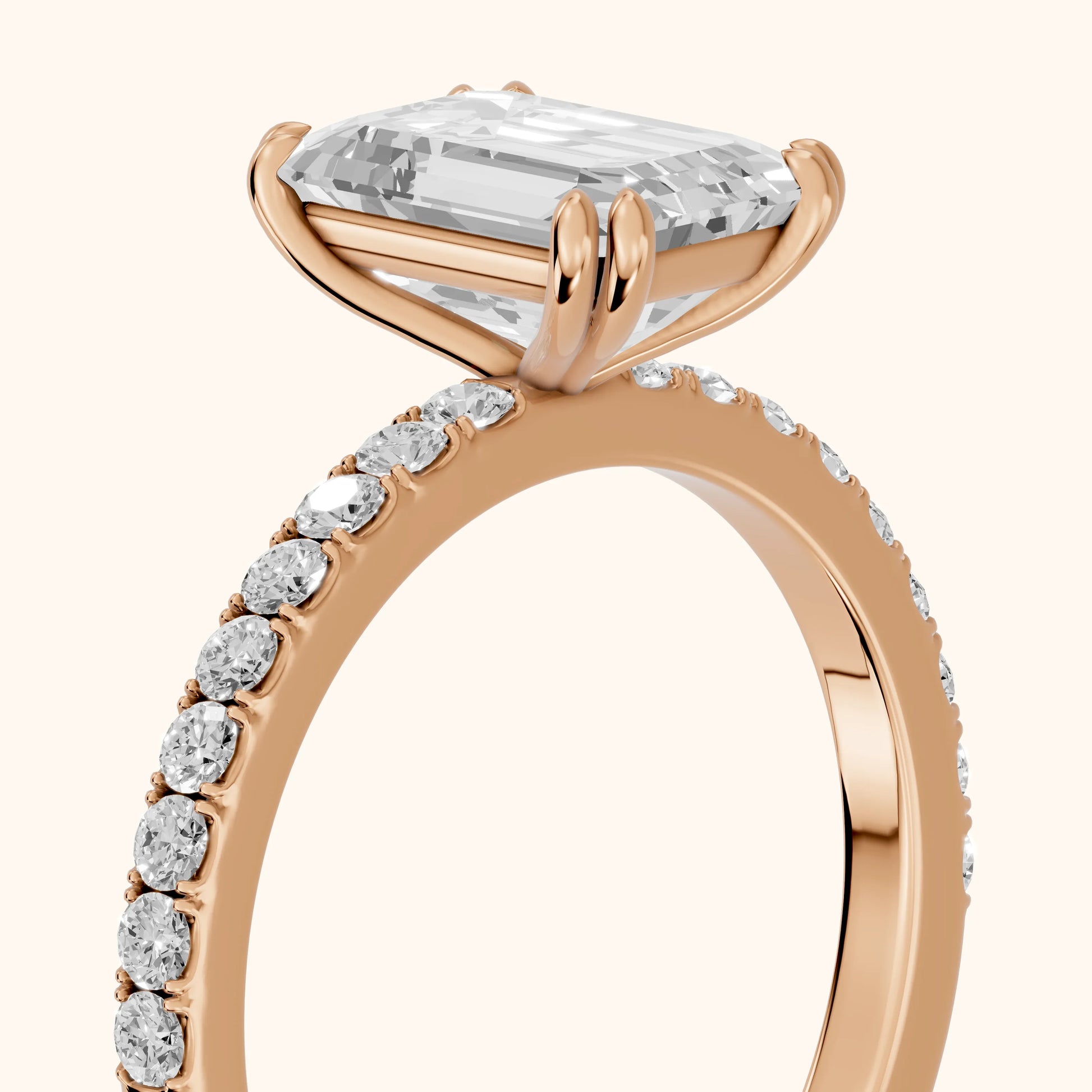 Novara Solitaire Pavé Emerald Diamond Ring in Rose Gold - slant-view.webp