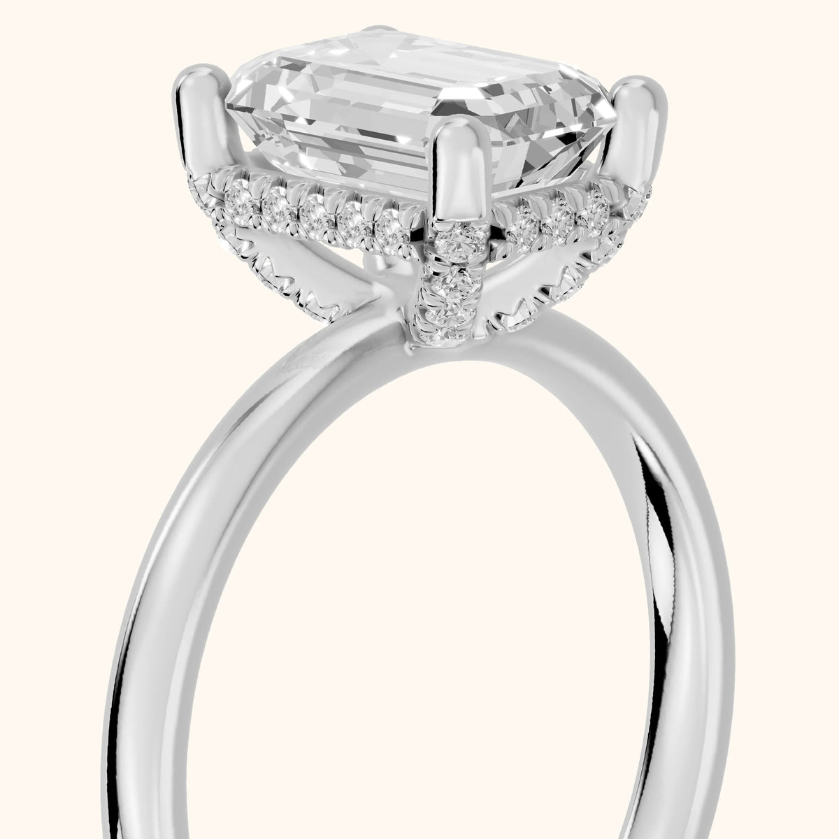 Dina Hidden Halo Emerald Diamond Engagement Ring in Platinum - slant-view.webp