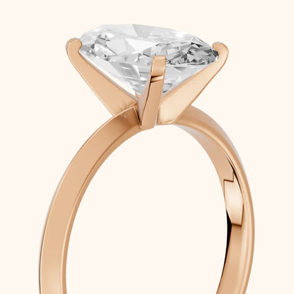 Verity Solitaire Knife Edge Oval Diamond Engagement Ring in Rose Gold - slant-view.webp