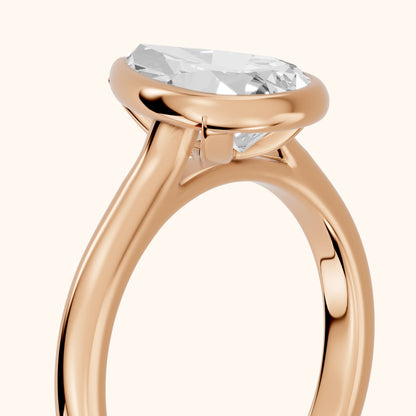 Jolie Bezel Solitaire Pear Diamond Engagement Ring in Rose Gold - slant-view.webp