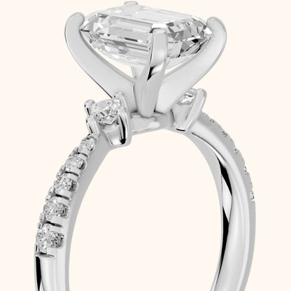 Alethea Three-Stone Pavé Emerald Diamond Engagement Ring in Silver - slant-view.webp