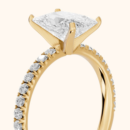 Juna French Pavé Solitaire Radiant Diamond Engagement Ring in Yellow Gold - slant-view.webp