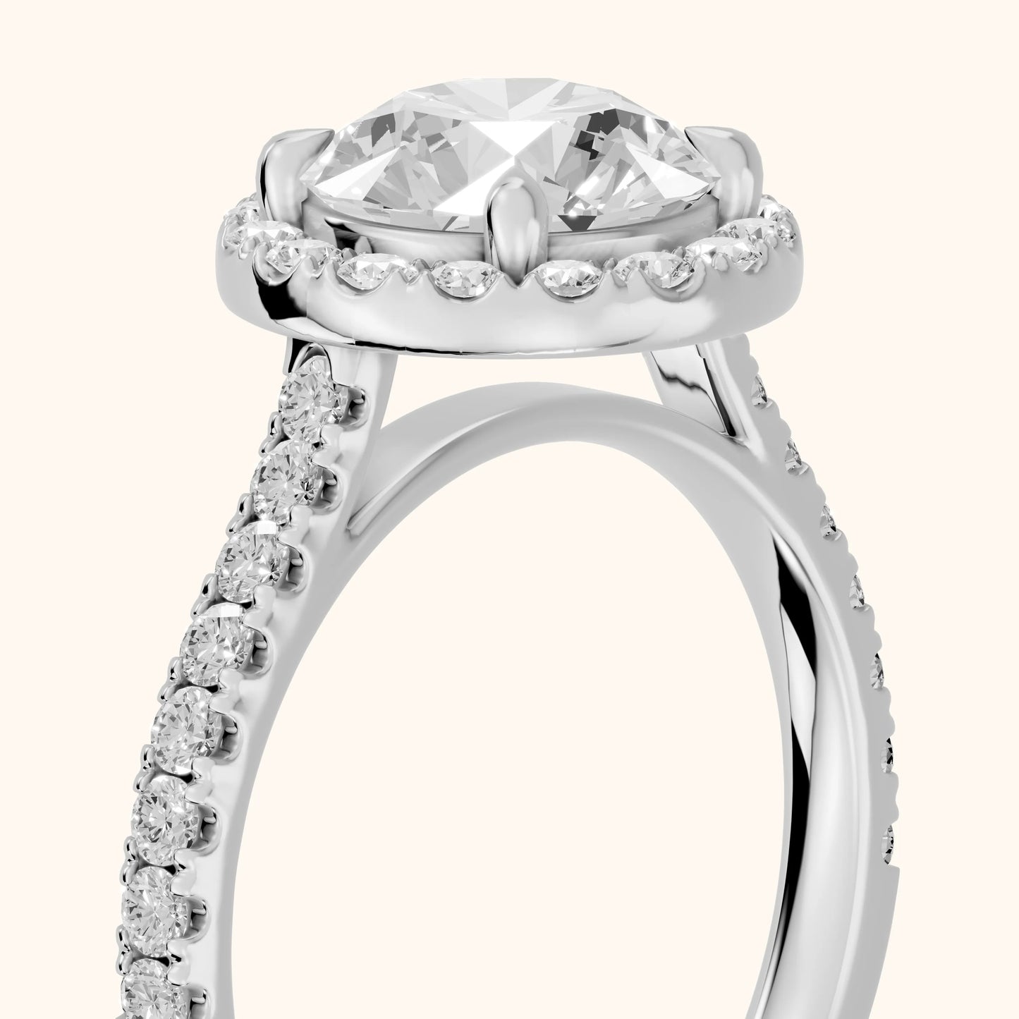 Amara Halo Claw Prong Round Diamond Ring in Platinum - slant-view.webp