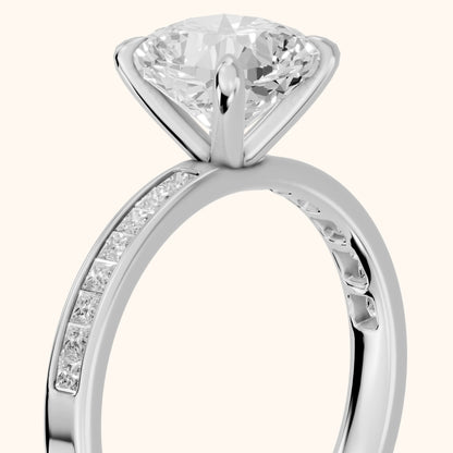 Maren Sidestone Channel Set Cushion Diamond Engagement Ring in Platinum - slant-view.webp