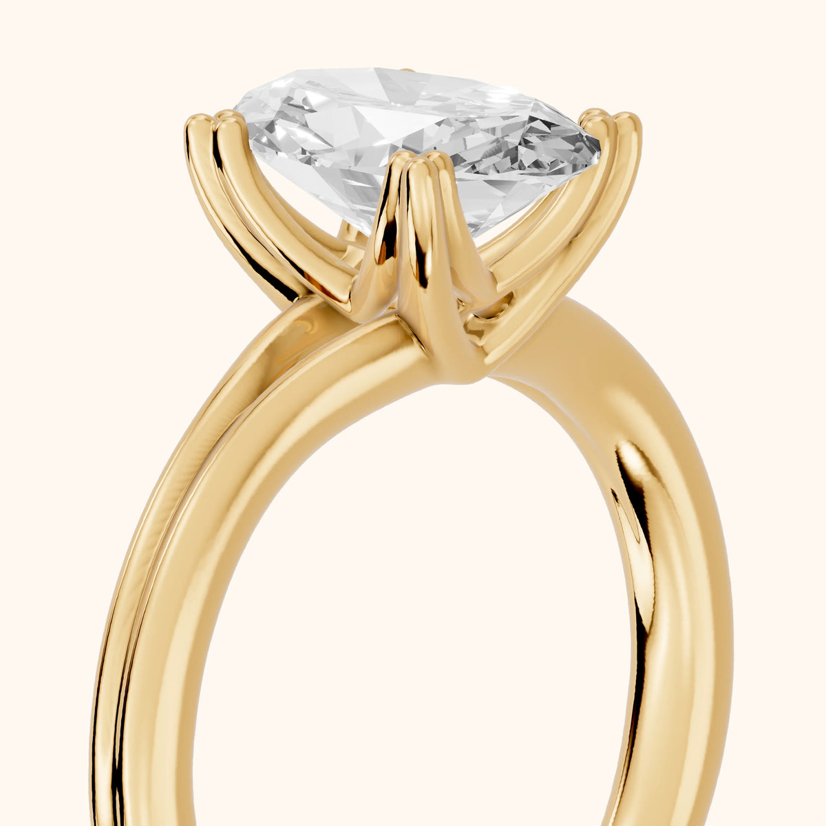Neve Solitaire Split Shank Oval Diamond Engagement Ring in Yellow Gold - slant-view.webp