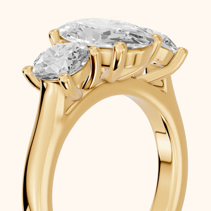 Callie Three-Stone Trellis Oval Diamond Engagement Ring in Yellow Gold - slant-view.webp