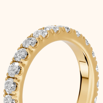 Ramona Shared Prong Round Diamond Eternity Band in Yellow Gold - slant-view