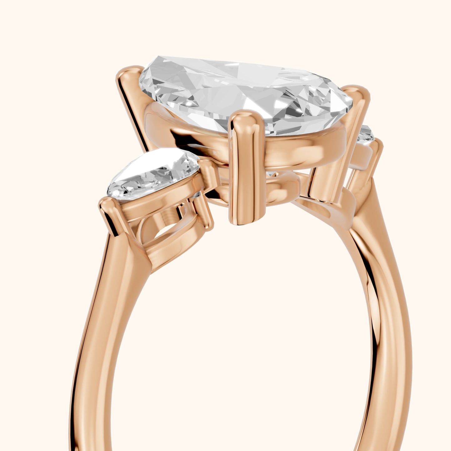 Faye Three-Stone Trellis Pear Diamond Ring in Rose Gold - slant-view.webp
