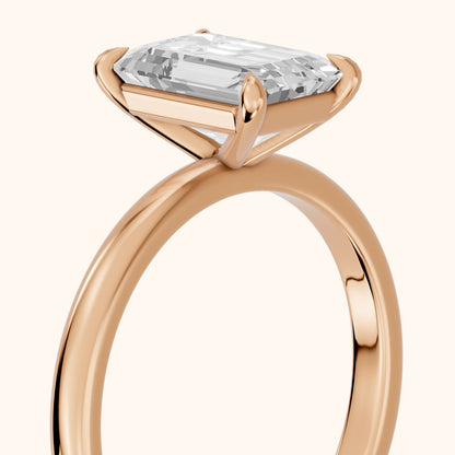 Lyla Petite Solitaire Emerald Diamond Engagement Ring in Rose Gold - slant-view.webp
