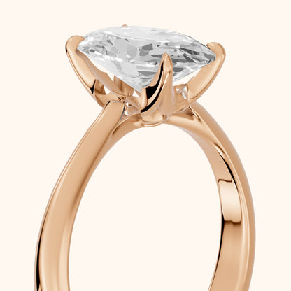 Evie Solitaire Six-Prong Oval Diamond Engagement Ring in Rose Gold - slant-view.webp