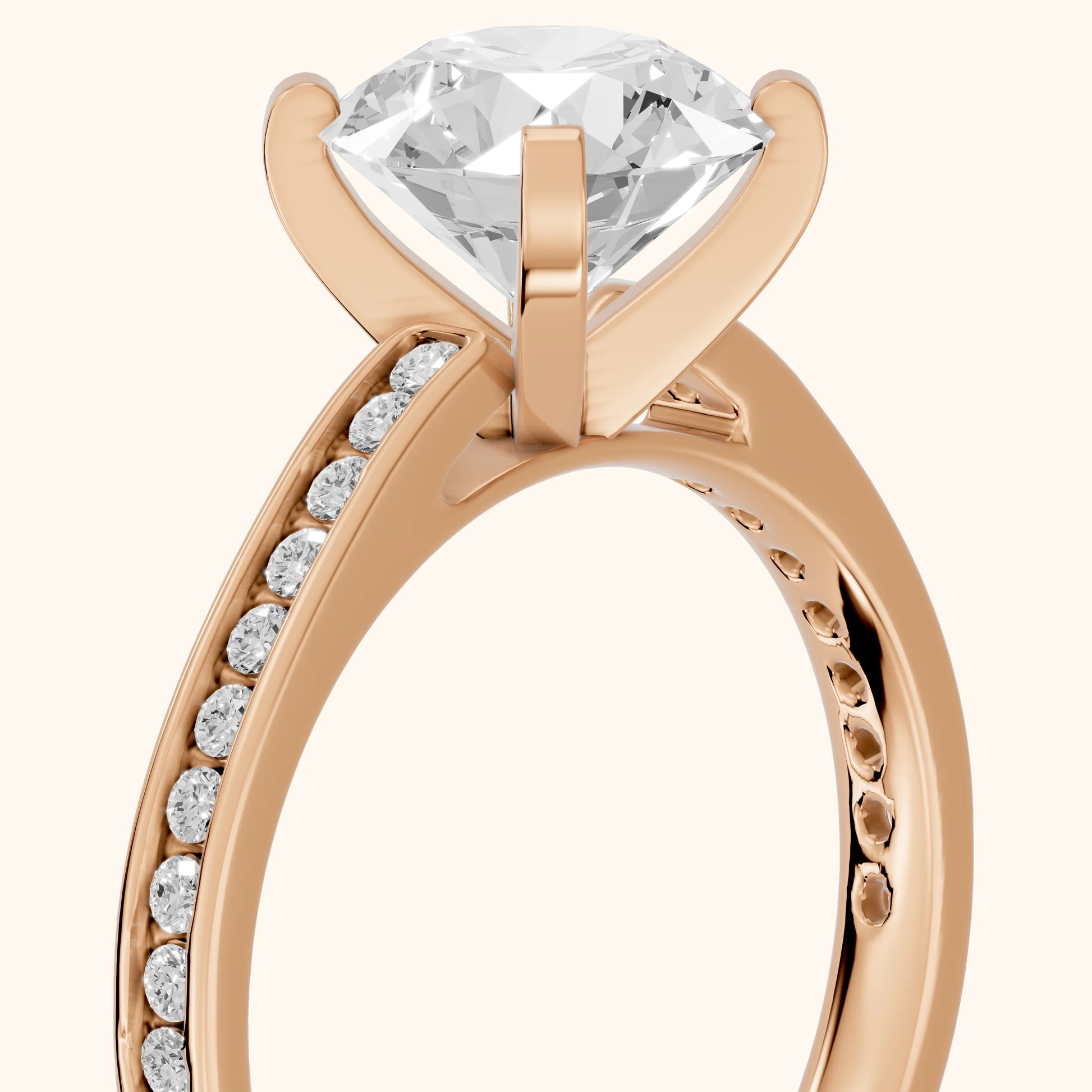 Tessa Solitaire Channel Set Round Diamond Engagement Ring in Rose Gold - slant-view.webp