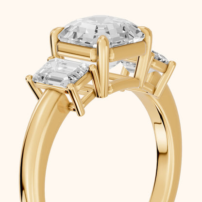 Zoe Three-Stone Asscher Diamond Ring in Yellow Gold - slant-view.webp
