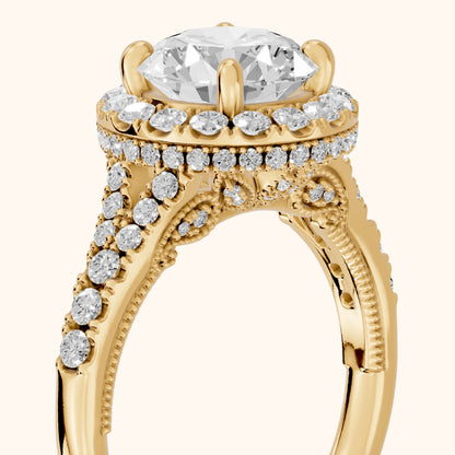 Kenner Halo Split Shank Round Diamond Engagement Ring in Yellow Gold - slant-view.webp