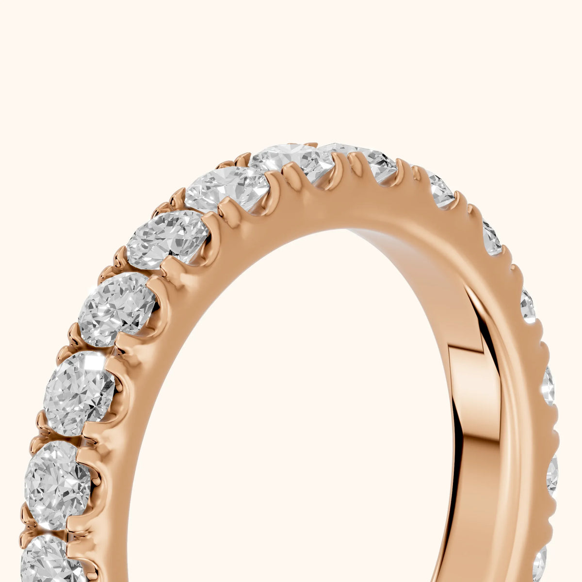 Ramona Shared Prong Round Diamond Eternity Band in Rose Gold - slant-view