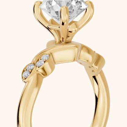 Robin Leaf Twist Round Diamond Engagement Ring in Yellow Gold - slant-view.webp