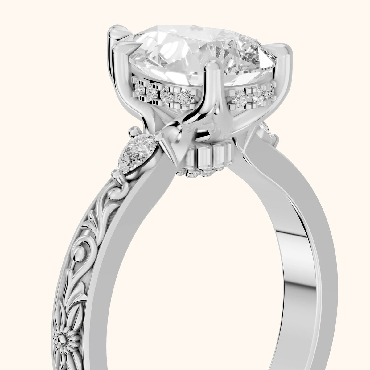 Siesta Three-Stone Engraved Pear Diamond Engagement Ring in Platinum - slant-view.webp
