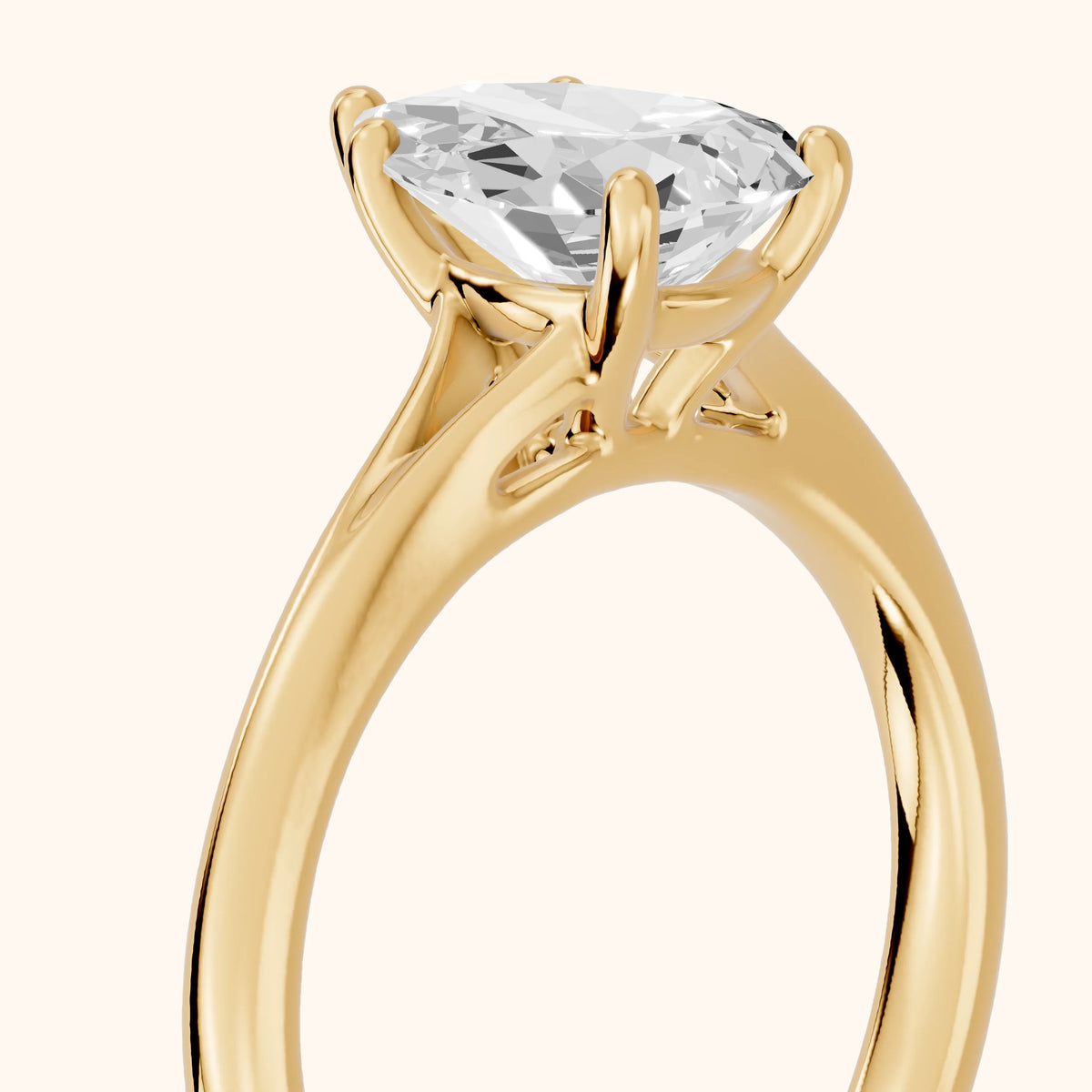 Melanie Solitaire Split Shank Pear Diamond Engagement Ring in Yellow Gold - slant-view.webp