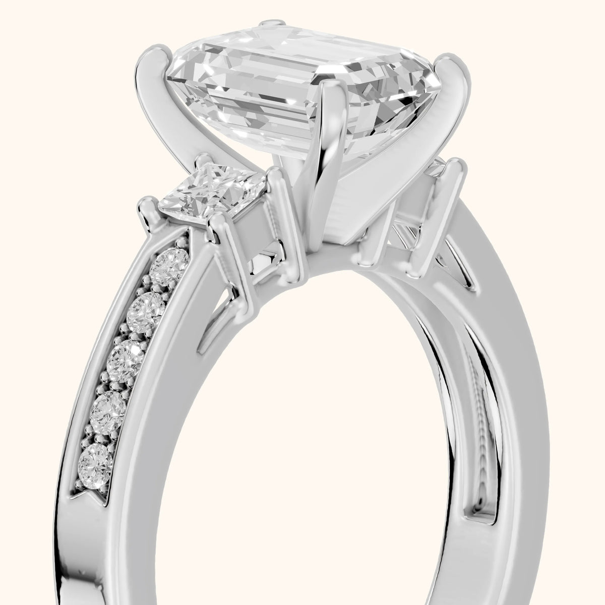 Ilona Three-Stone Channel Set Emerald Diamond Engagement Ring in White Gold - slant-view.webp