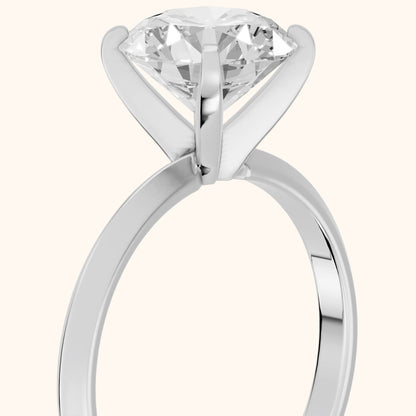 Verity Solitaire Knife Edge Round Diamond Engagement Ring in Platinum - slant-view.webp