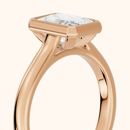 Jolie Bezel Solitaire Radiant Diamond Engagement Ring in Rose Gold - slant-view.webp