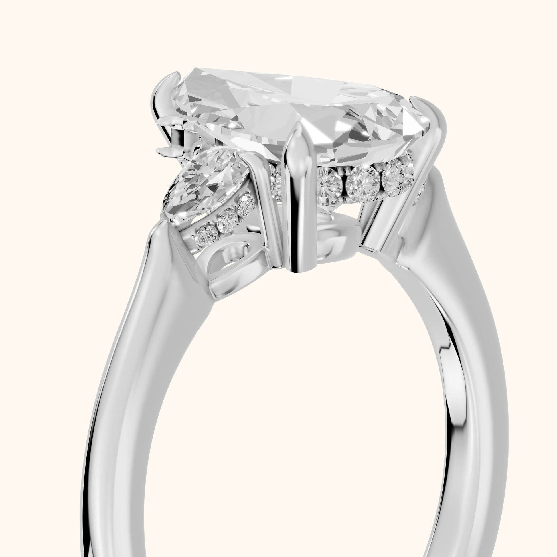Leila Three-Stone Pear Diamond Engagement Ring in White Gold - slant-view.webp