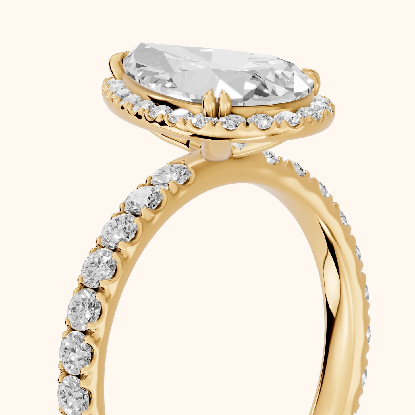 Chloe Halo Pavé Pear Diamond Ring in Yellow Gold - slant-view.webp