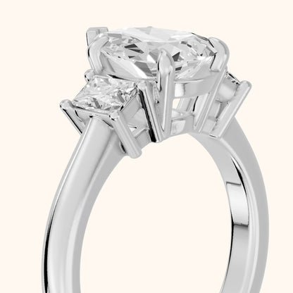 Cosette Statement Three-Stone Pear Diamond Engagement Ring in Platinum - slant-view.webp