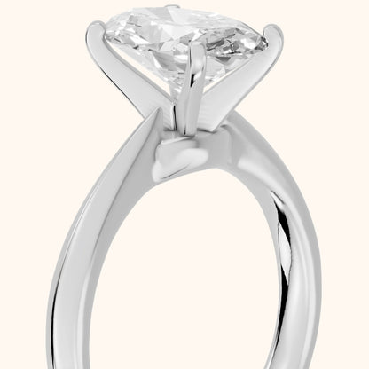 Arlette Solitaire Knife Edge Oval Diamond Engagement Ring in Platinum - slant-view.webp