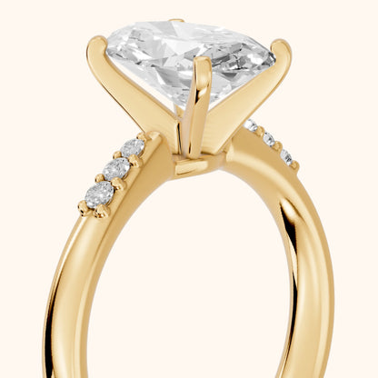 Eugenie Flush-Set Oval Diamond Engagement Ring in Yellow Gold - slant-view.webp
