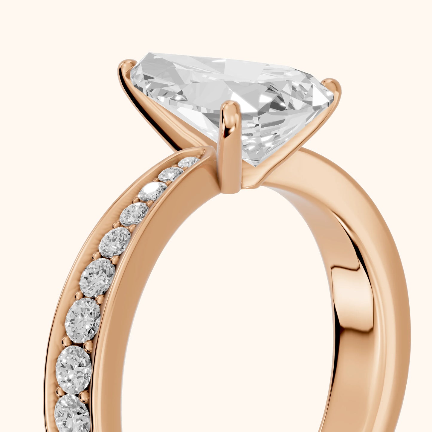 Rhea Sidestone Pavé Pear Diamond Engagement Ring in Rose Gold - slant-view.webp