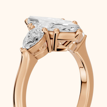 Mirabel Three-Stone Marquise Diamond Engagement Ring in Rose Gold - slant-view.webp
