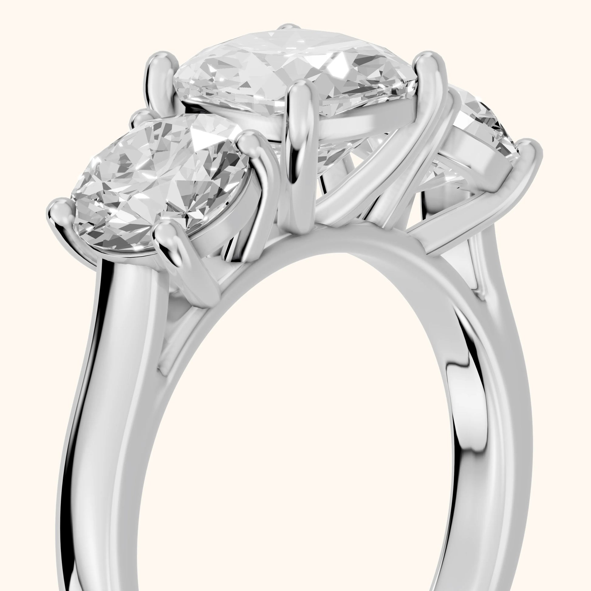 Esme Three-Stone Tapered Cushion Diamond Ring in Platinum - slant-view.webp