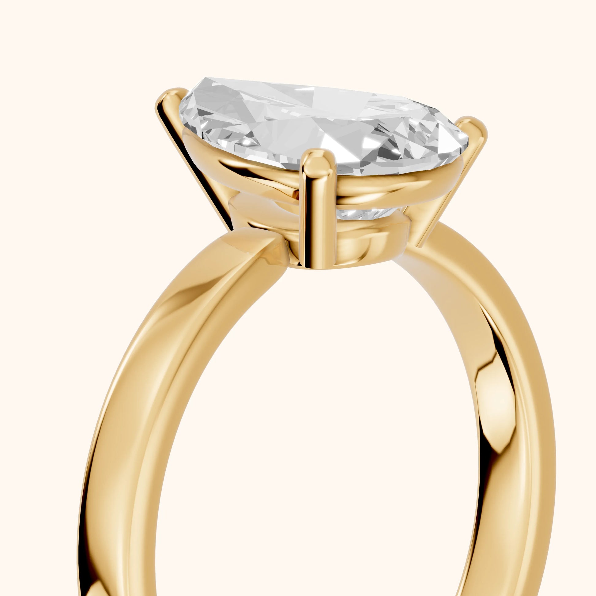 Delia Solitaire Pear Diamond Engagement Ring in Yellow Gold - slant-view.webp