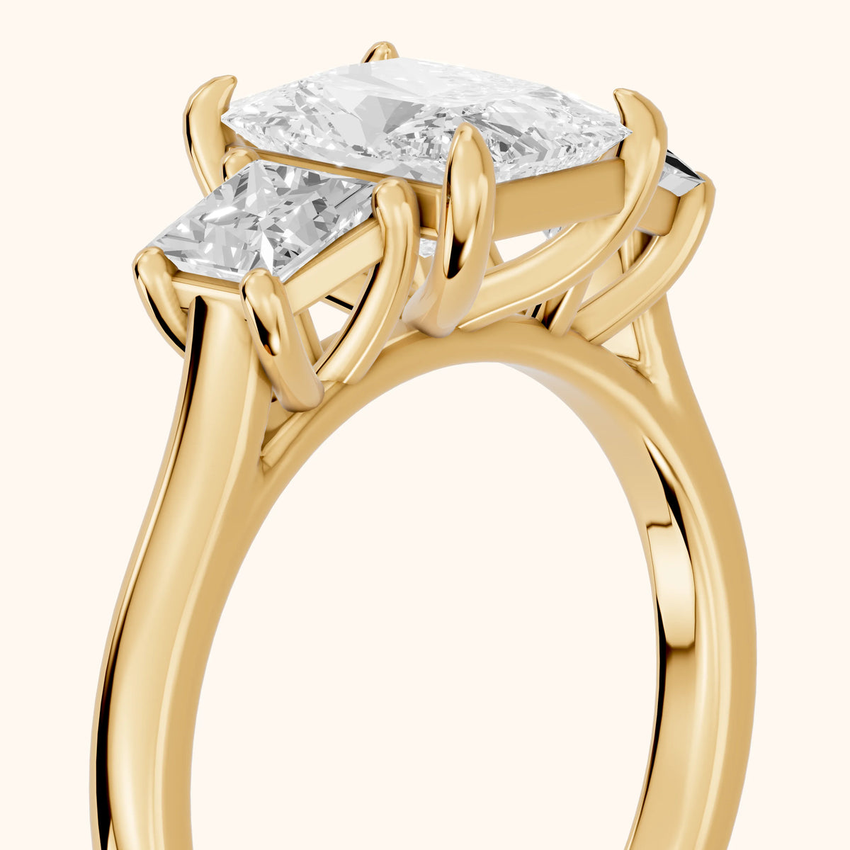 Sienna Three-Stone Radiant Diamond Engagement Ring in Yellow Gold - slant-view.webp