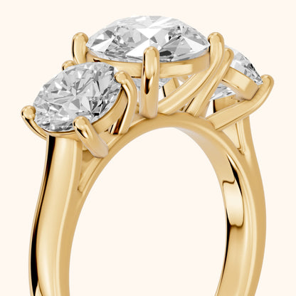 Esme Three-Stone Tapered Round Diamond Ring in Yellow Gold - slant-view.webp