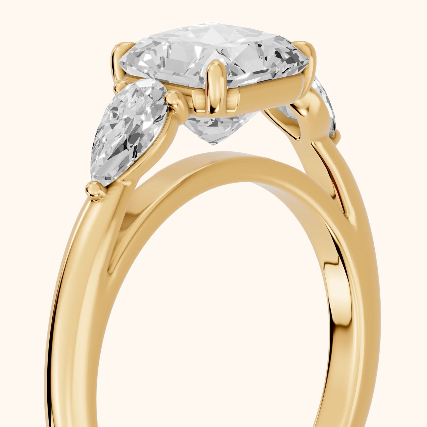 Phoebe Three-Stone Radiant Diamond Ring in Yellow Gold - slant-view.webp