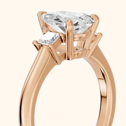 Brenna Three-Stone Pear Diamond Engagement Ring in Rose Gold - slant-view.webp