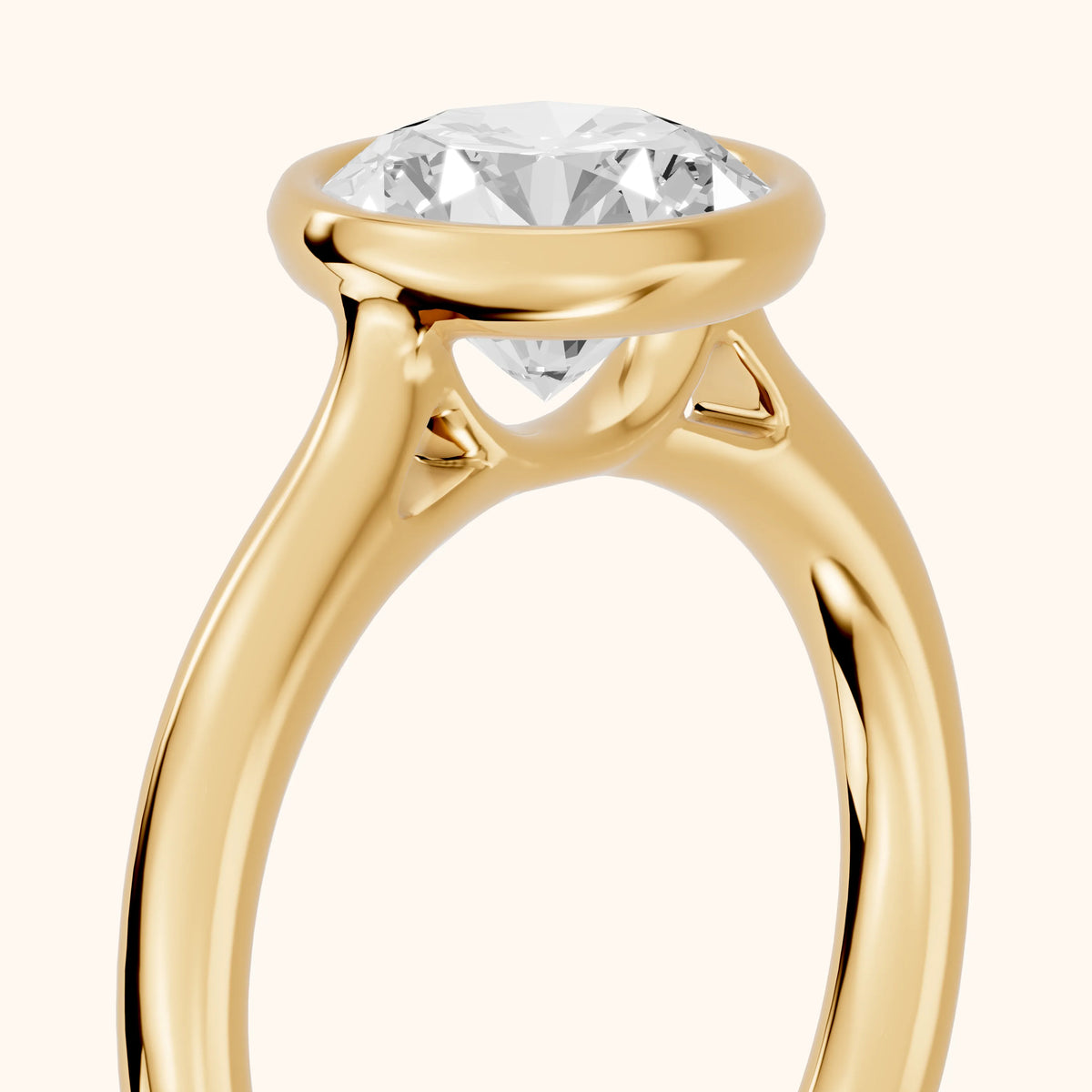 Isla Bezel Solitaire Round Diamond Engagement Ring in Yellow Gold - slant-view.webp