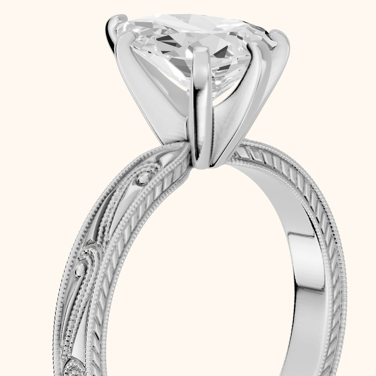 Abbie Engraved Solitaire Pear Diamond Engagement Ring in Platinum - slant-view.webp