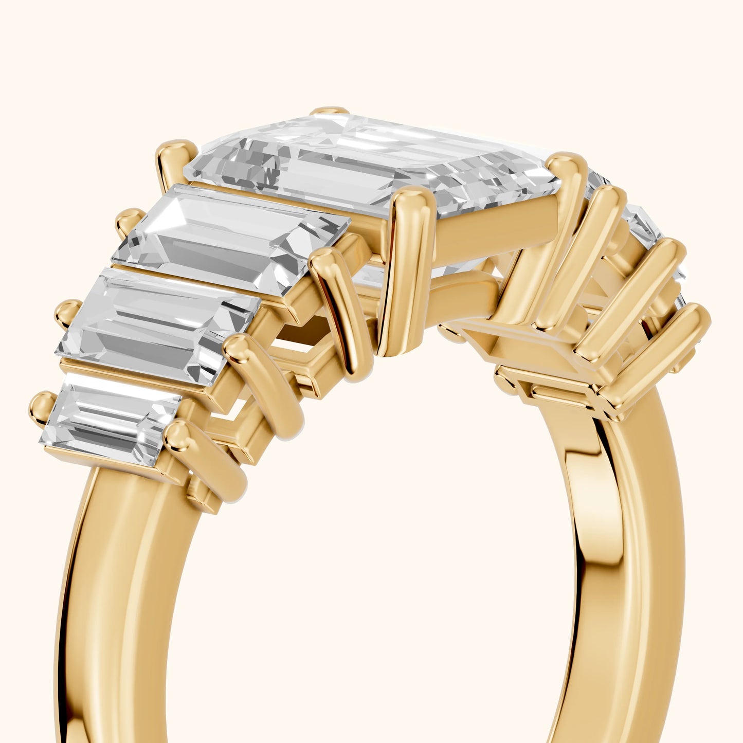 Mara Sidestone Baguette Accent Emerald Diamond Engagement Ring in Yellow Gold - slant-view.webp
