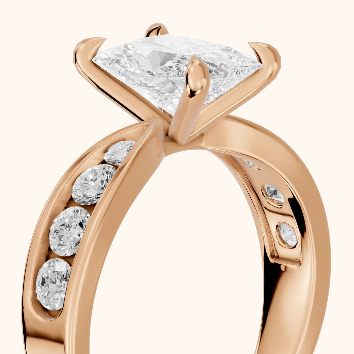 Rosalie Channel Set Sidestone Radiant Diamond Engagement Ring in Rose Gold - slant-view.webp