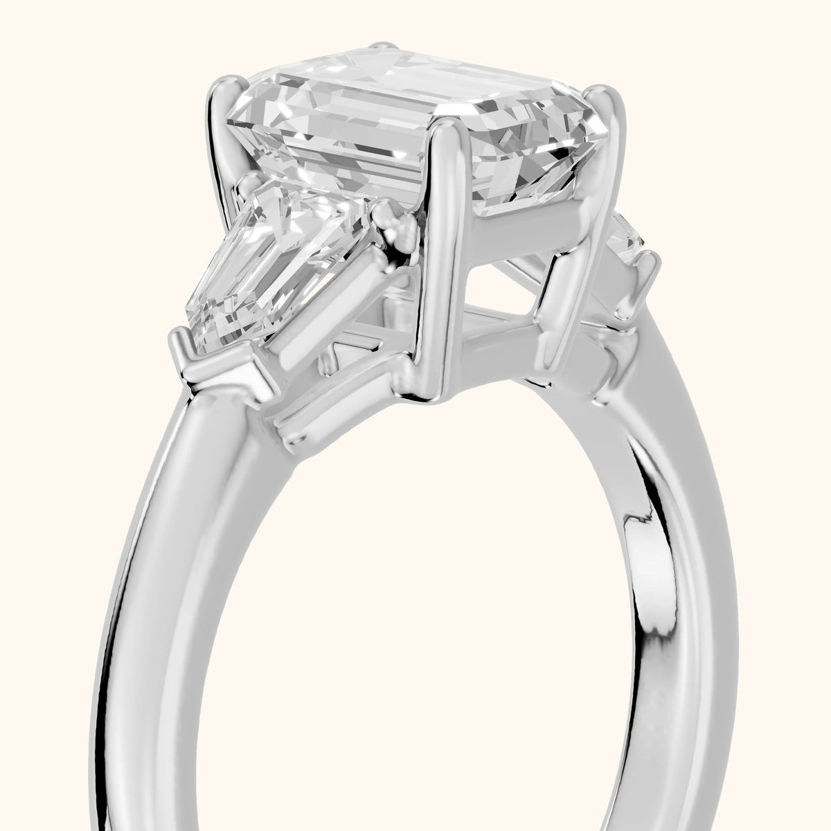 Dorothea Baguette Three-Stone Emerald Diamond Engagement Ring in Silver - slant-view.webp